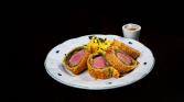 Fillet roasted in puff pastry with mashed potatoes and coarse mustard sauce